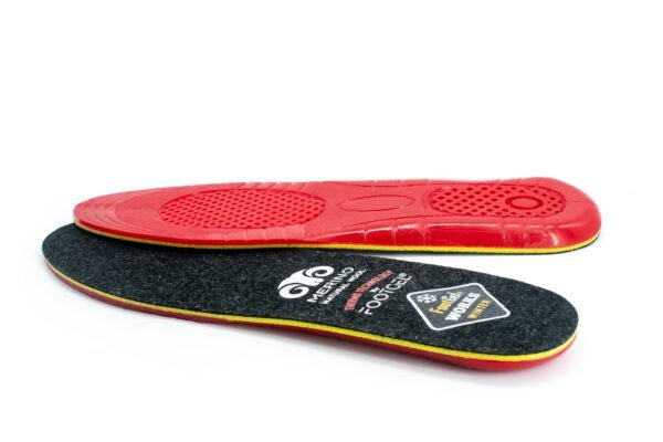 Footgel Works Winter angled view of the black merino wool surface and red gel underside